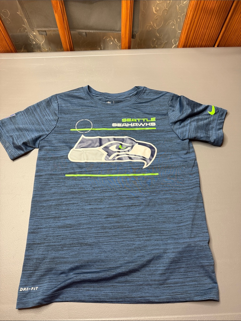 Kid’s Nike Dri-fit Seattle Seahawks Tee - Navy with Neon Green. Size: small